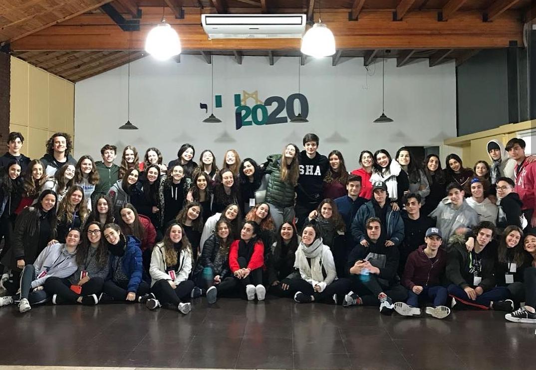 Group of people celebrating on stage