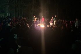 Group of people celebrating on stage