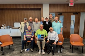 Group of people celebrating on stage