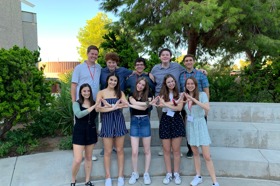 Group of people celebrating on stage