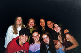 Group of people celebrating on stage