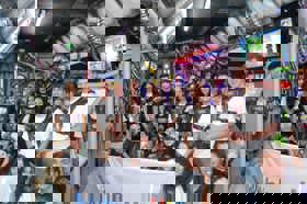 Group of people celebrating on stage