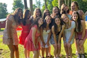 Group of people celebrating on stage