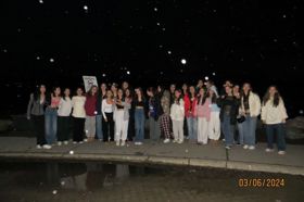 Group of people celebrating on stage