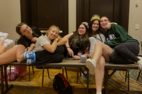 Group of people celebrating on stage