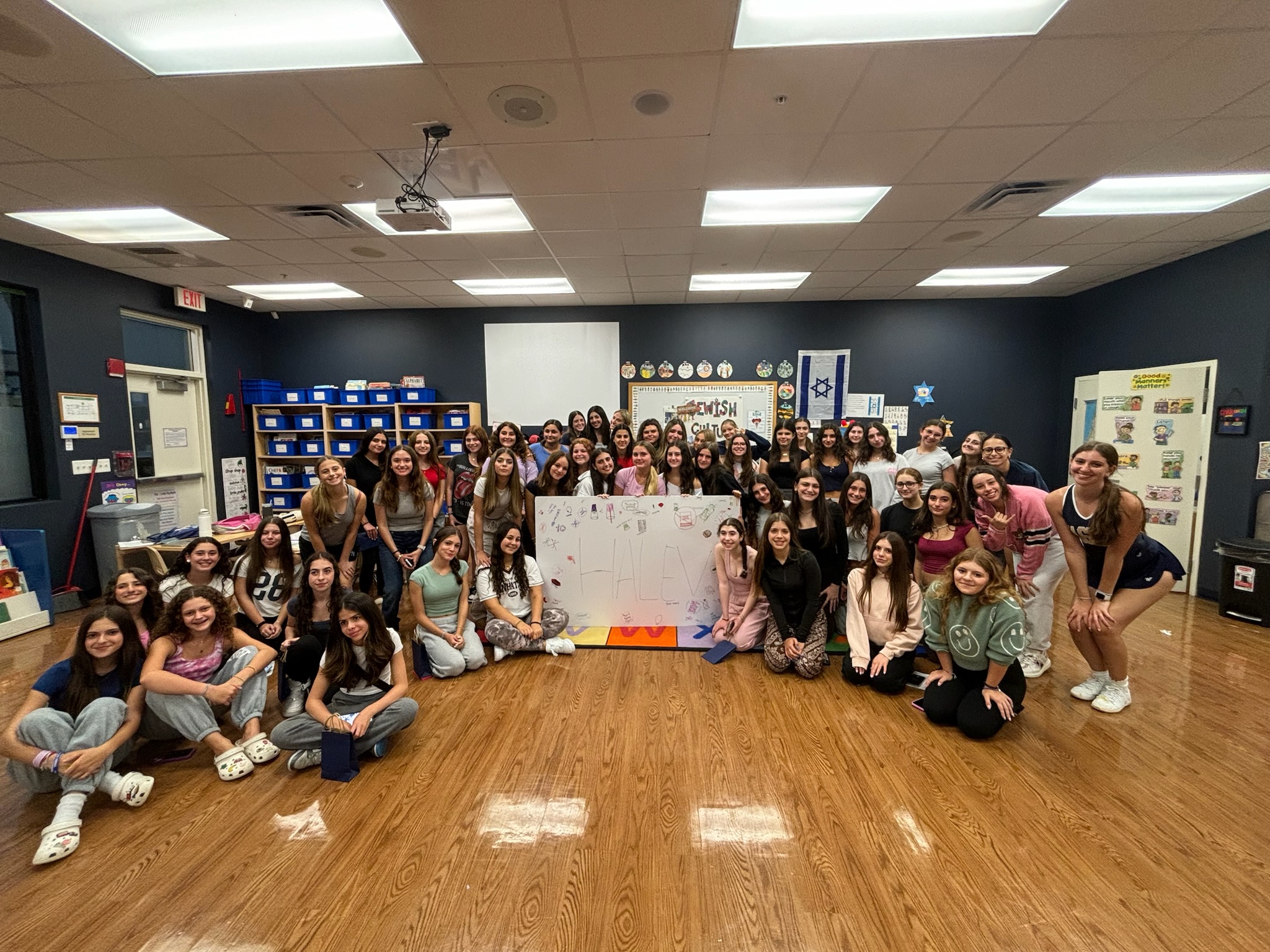 Group of people celebrating on stage
