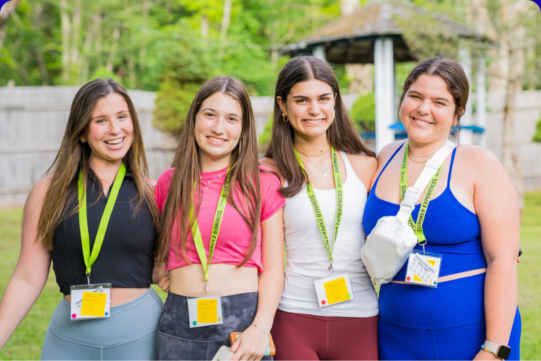 Group of people smiling outdoors