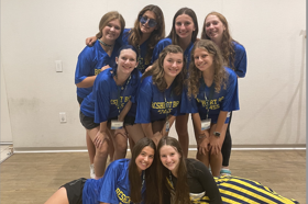 Group of people celebrating on stage