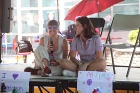 Group of people celebrating on stage