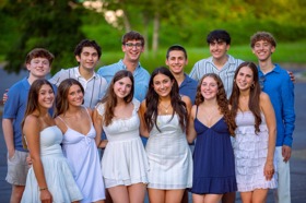 Group of people celebrating on stage