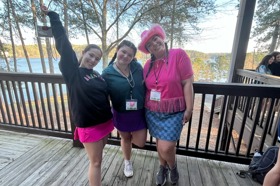 Group of people celebrating on stage