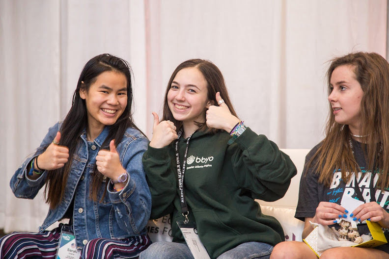 Group of people celebrating on stage