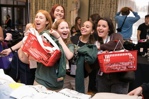 Group of people celebrating on stage