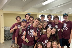 Group of people celebrating on stage