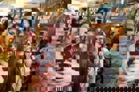 Group of people celebrating on stage