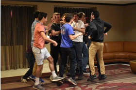 Group of people celebrating on stage