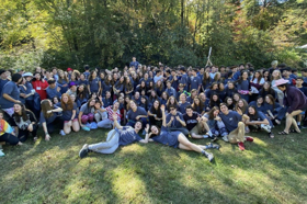 Group of people celebrating on stage