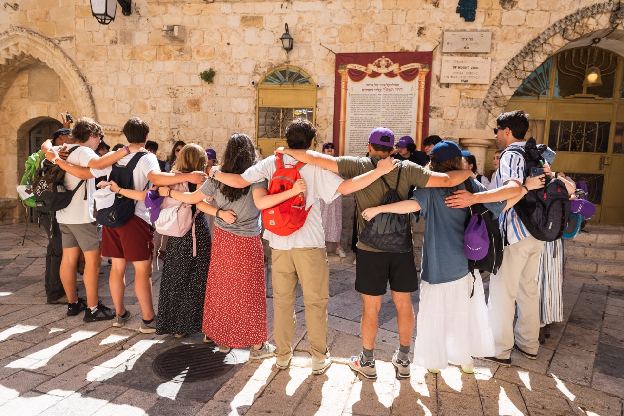 Group of people celebrating on stage