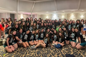 Group of people celebrating on stage