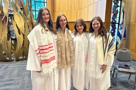 Group of people celebrating on stage