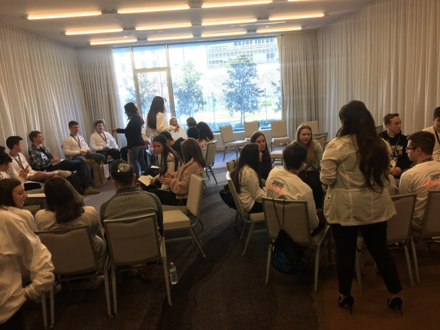 Group of people celebrating on stage