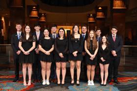 Group of people celebrating on stage
