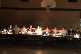 Group of people celebrating on stage