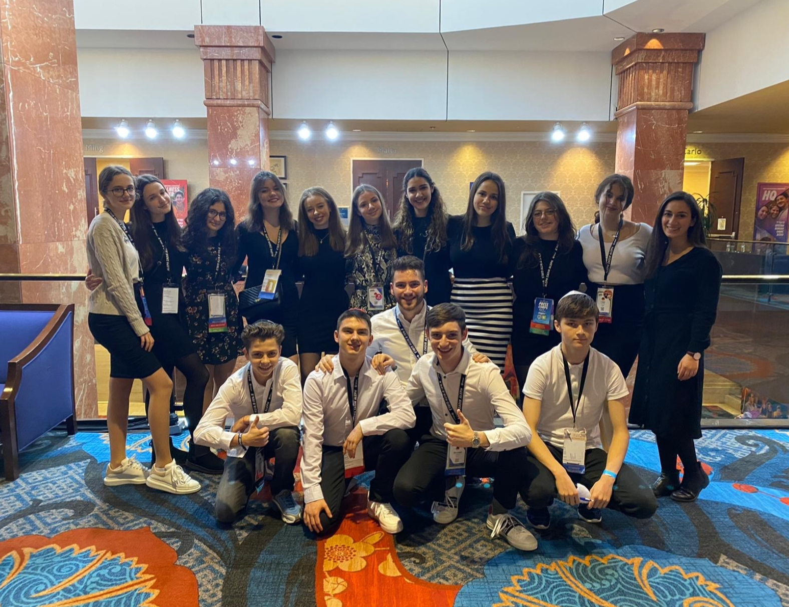 Group of people celebrating on stage