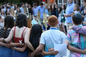 Group of people celebrating on stage