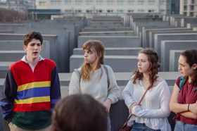 Group of people celebrating on stage