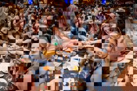 Group of people celebrating on stage