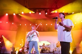 Group of people celebrating on stage