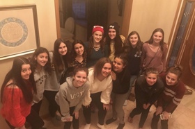 Group of people celebrating on stage