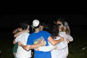 Group of people celebrating on stage