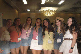 Group of people celebrating on stage