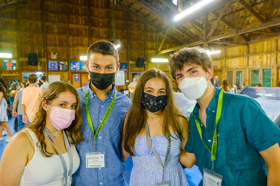 Group of people celebrating on stage