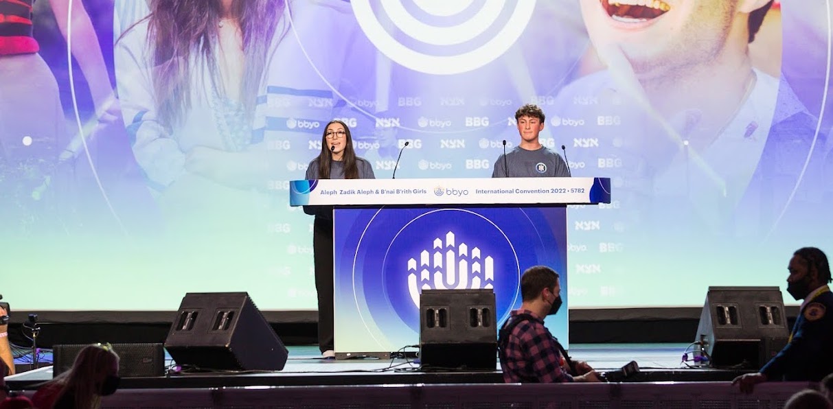Group of people celebrating on stage