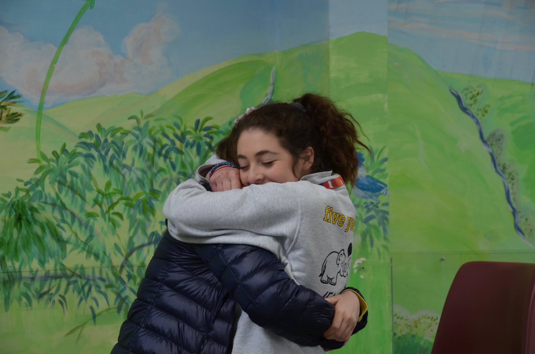 Group of people celebrating on stage