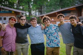 Group of people celebrating on stage