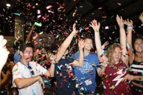 Group of people celebrating on stage