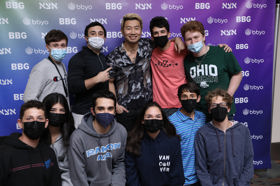 Group of people celebrating on stage