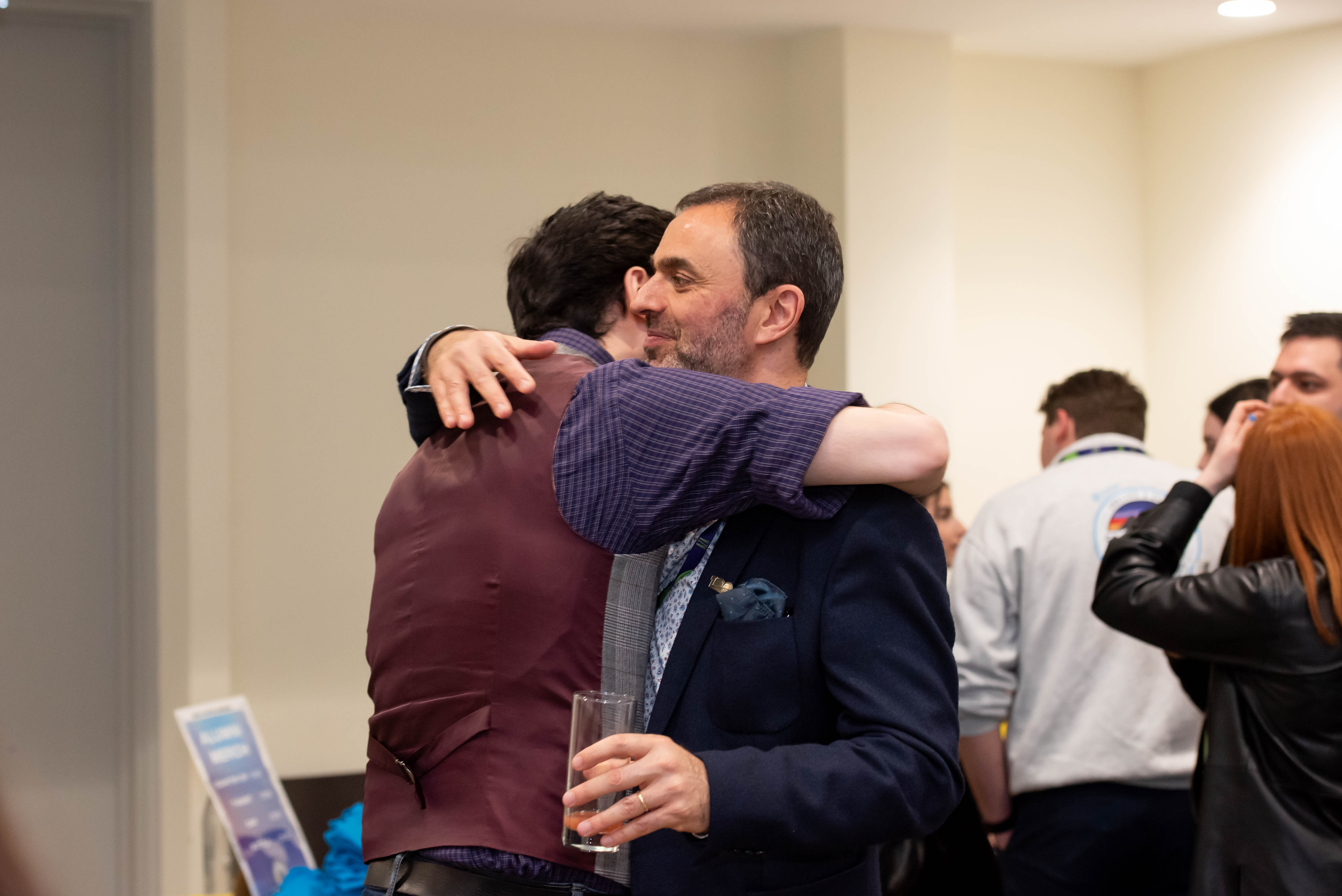 Group of people celebrating on stage