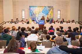 Group of people celebrating on stage