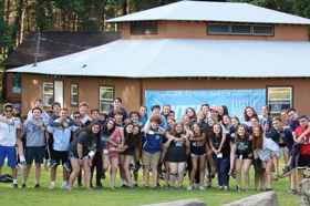 Group of people celebrating on stage