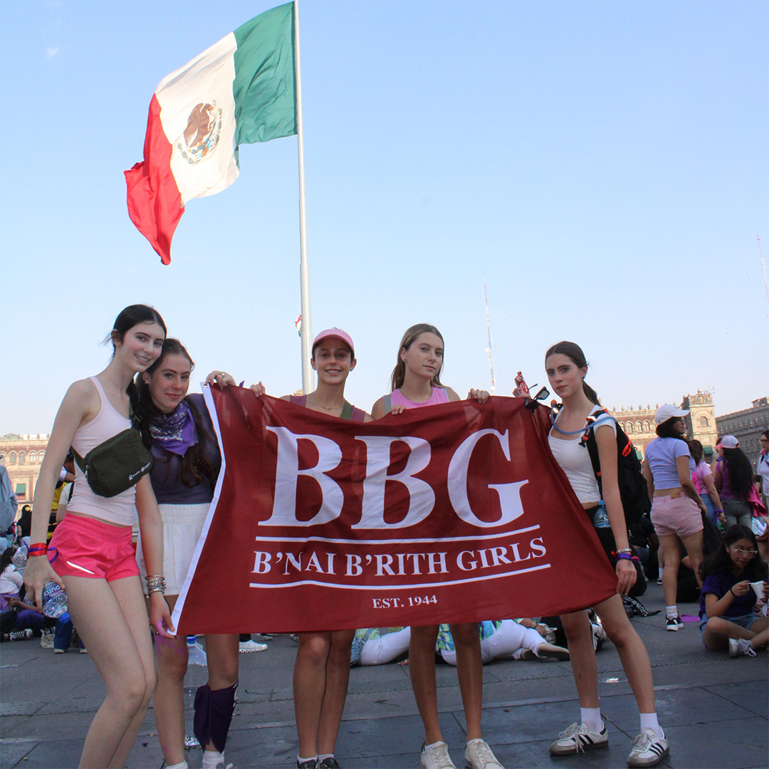 Group of people celebrating on stage
