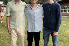 Group of people celebrating on stage