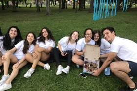 Group of people celebrating on stage