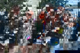 Group of people celebrating on stage