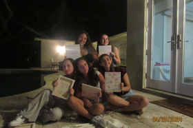 Group of people celebrating on stage