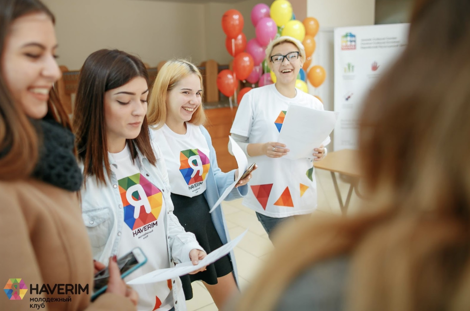 Group of people celebrating on stage